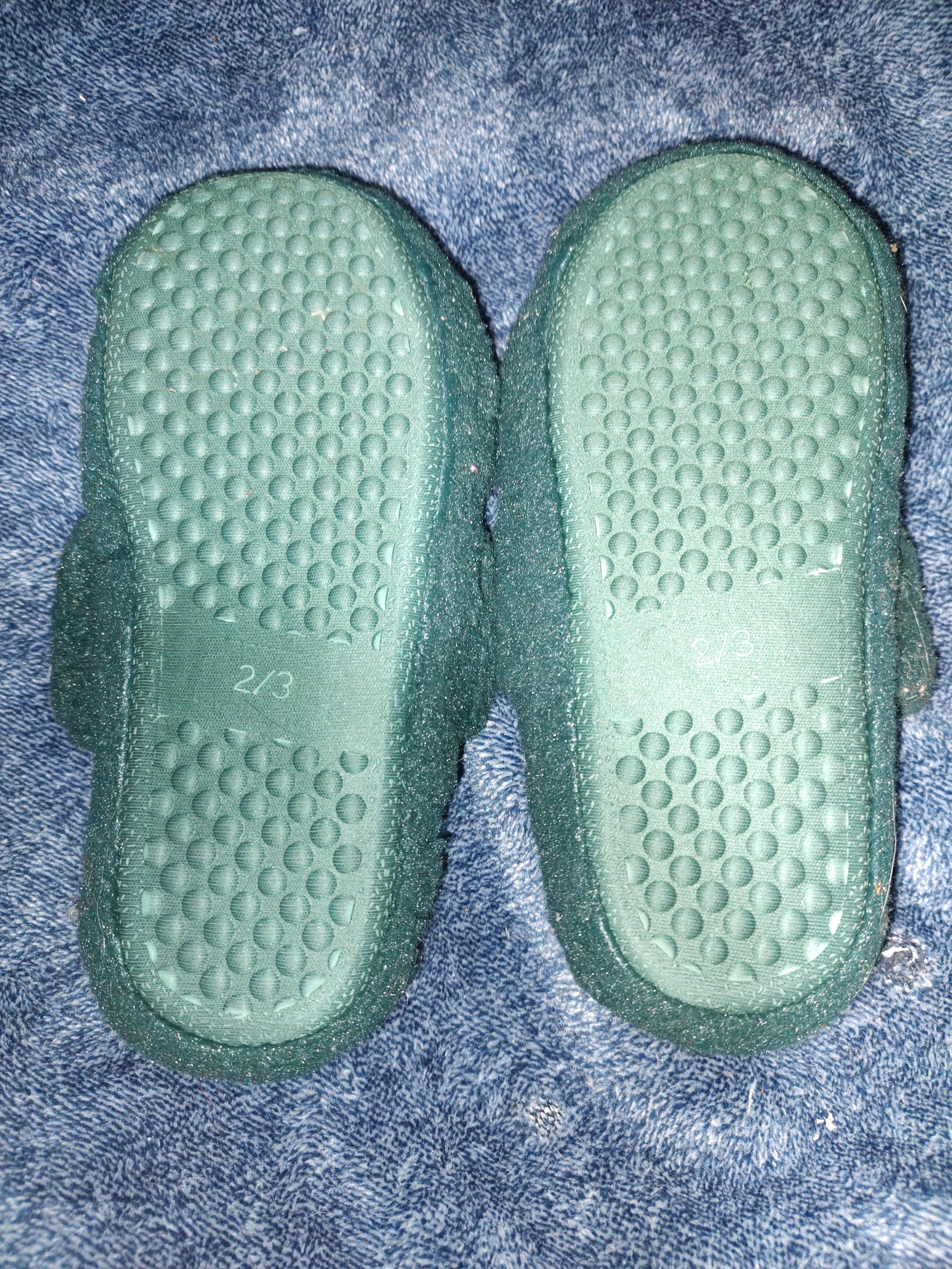 Green fuzzy slippers